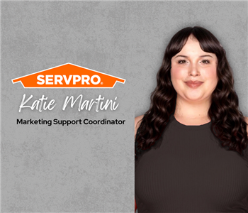 Servpro employee, woman in black polo